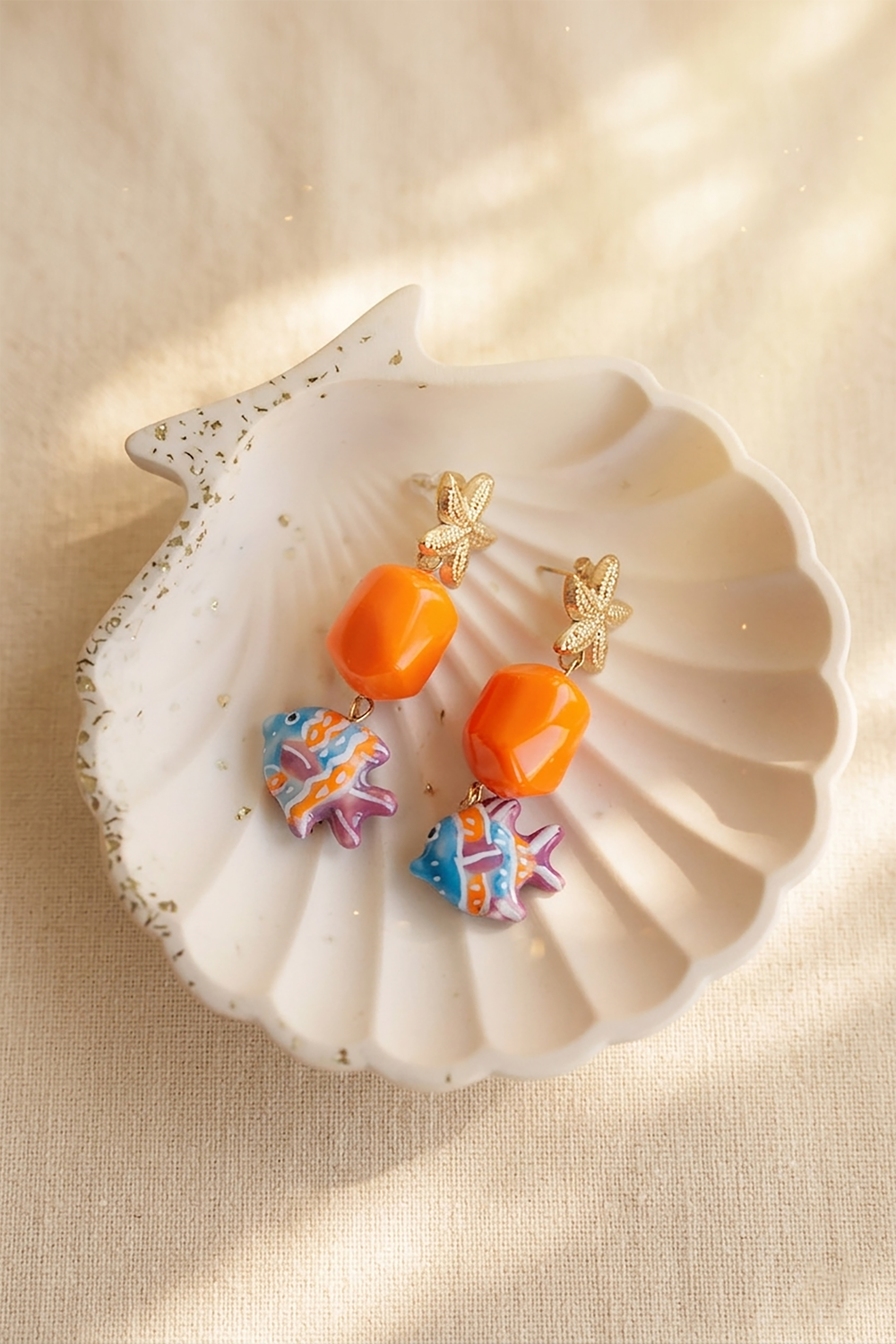 Schéma Boucles d'oreilles pendantes étoiles de mer et poissons Schéma Boucles d'oreilles pendantes étoiles de mer et poissons