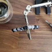 Perle tête de mort 10x8 mm imitation Howlite teintée - Noir x1